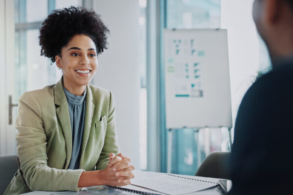 An HR manager having a face-to-face interview with a job seeker.