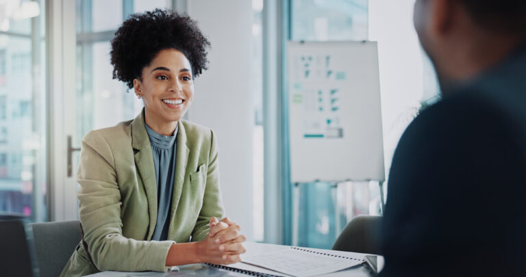 An HR manager having a face-to-face interview with a job seeker.